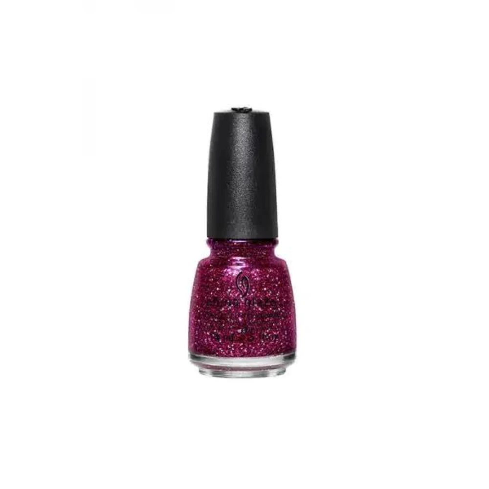 China Glaze Nail Polish .5 oz - Turn Up The Heat - Magenta clear base with magenta small and micro hexes, light pink small hexes and purple shimmer.