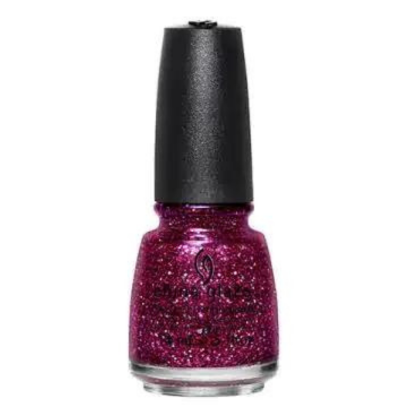 China Glaze Nail Polish .5 oz - Turn Up The Heat - Magenta clear base with magenta small and micro hexes, light pink small hexes and purple shimmer.