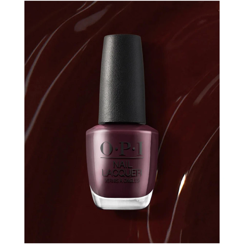 OPI Nail Polish - Complimentary Wine - NLMI12 - A deep bouquet of ripened berries delight the senses to embody a full velvet burgundy in this nail polish.