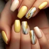 Radiant Sunshine: Embrace Soft Yellow Nails for a Cheerful Spring Vibe!